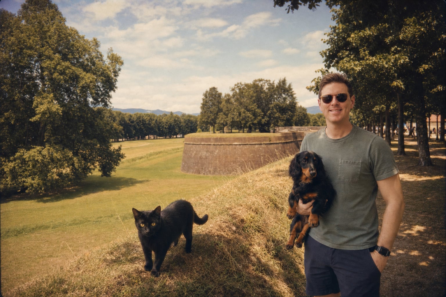 The man smiles; the animals know something he doesn't about the old fortress behind him.
