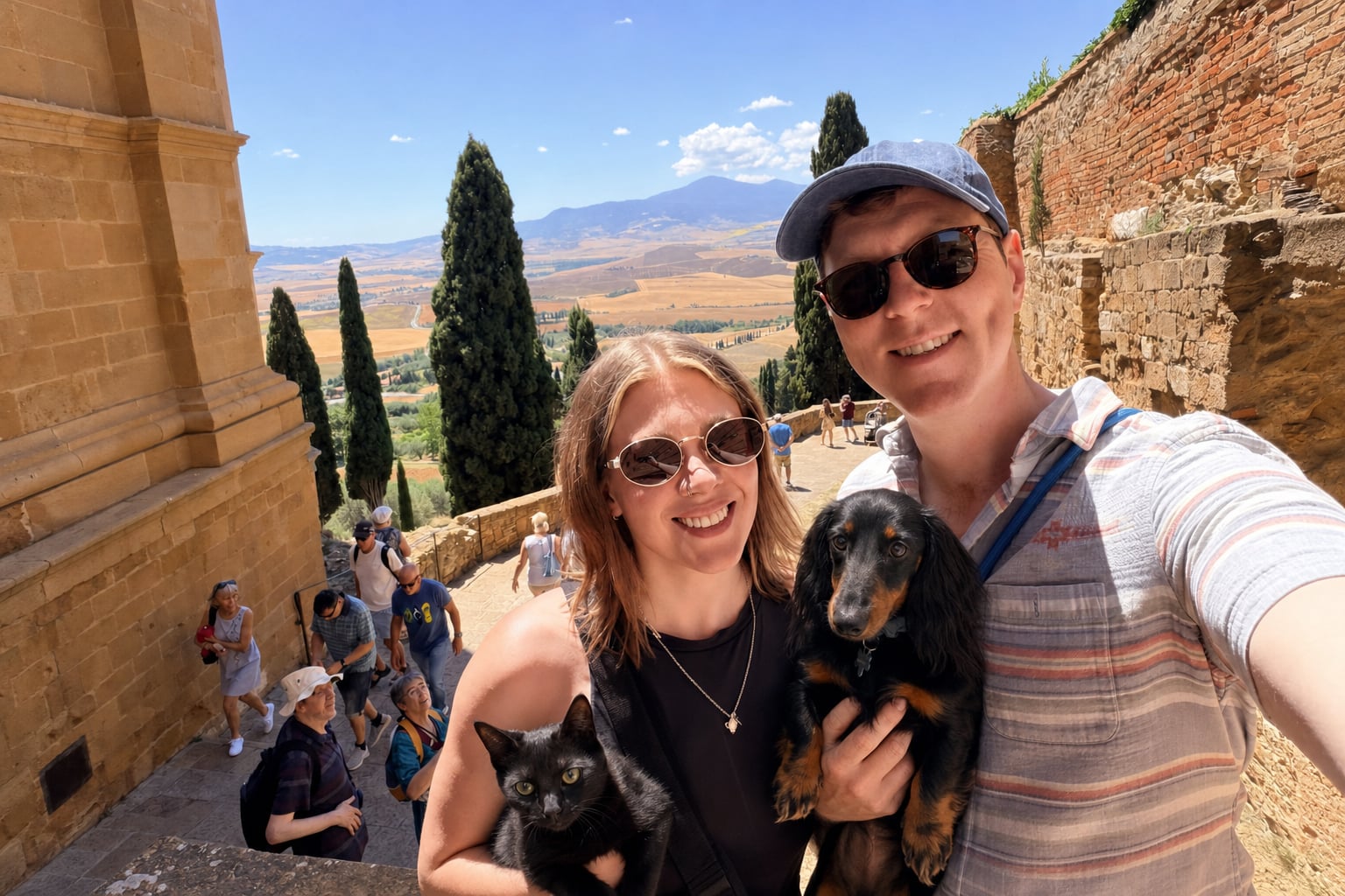 Two tourists, two dogs, and a mountain that has seen everything smile for the camera.